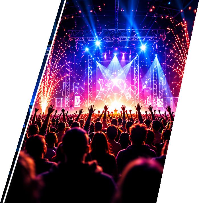 Concert crowd under colourful stage lighting and confetti